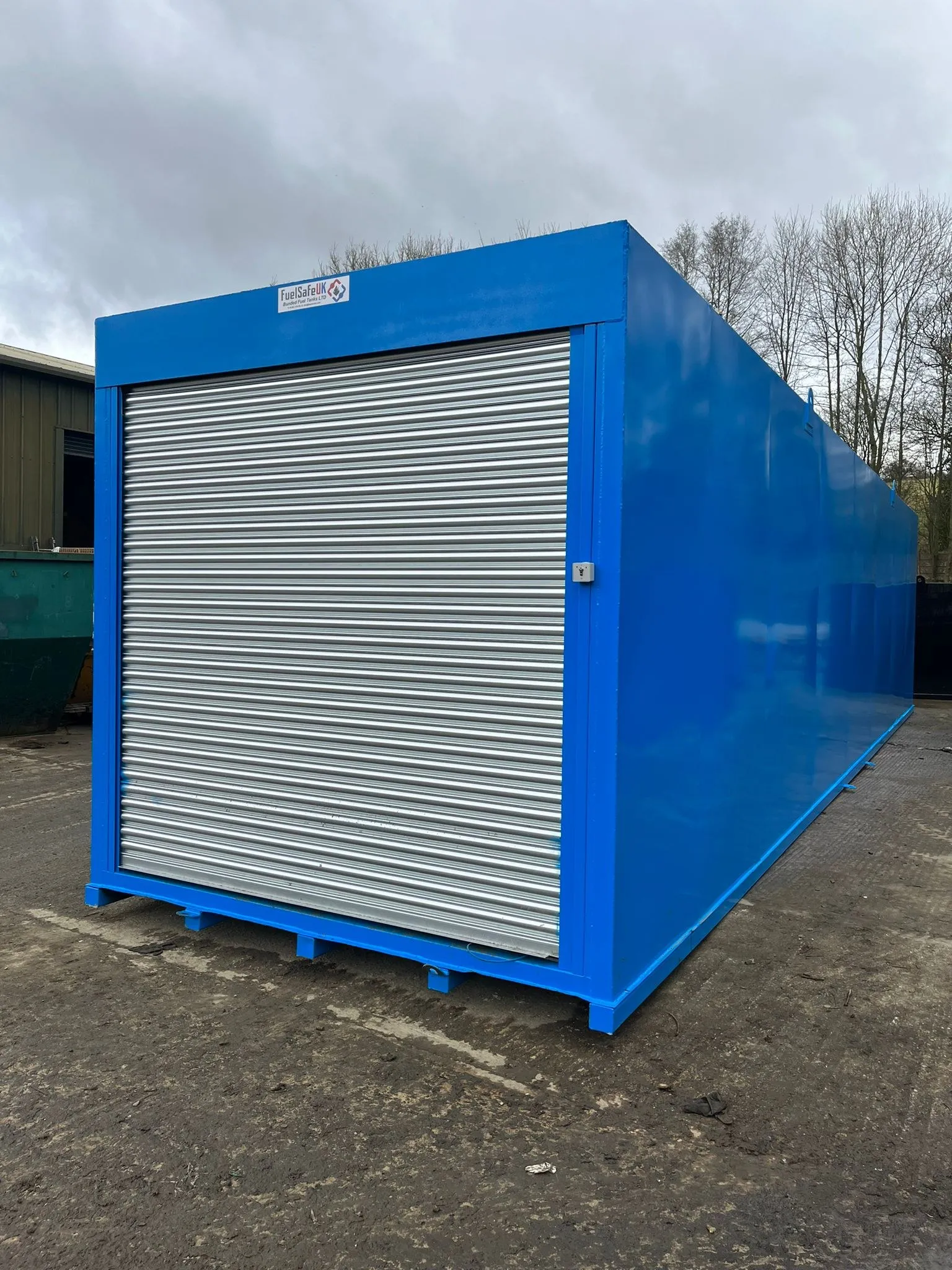 100,000 litre bunded fuel tank with a roller shutter dispensing bay