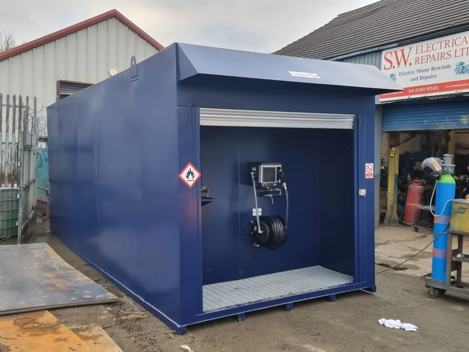 50,000 litre bunded fuel tank with a roller shutter dispenser bay
