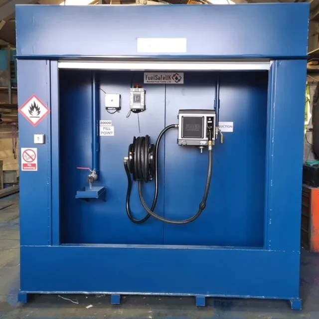 Inside a bunded fuel tank dispenser cabinet with hose reel and pump