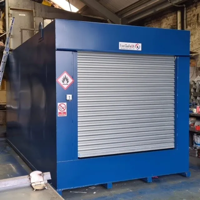 Blue bunded fuel tank with roller shutter in the workshop