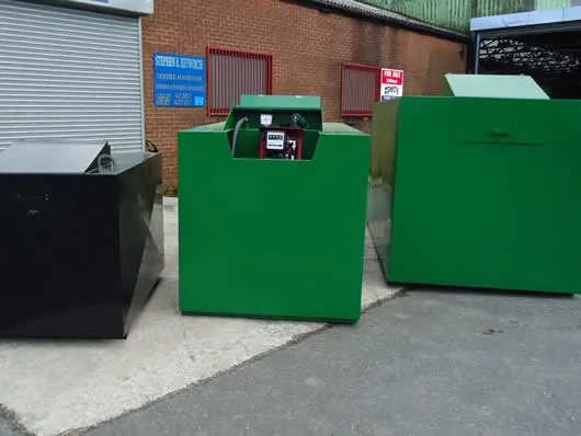 Bunded oil tanks stored outside the Fuel Safe UK workshop